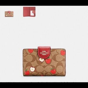 Authentic coach wallet brand new and Negotiable.